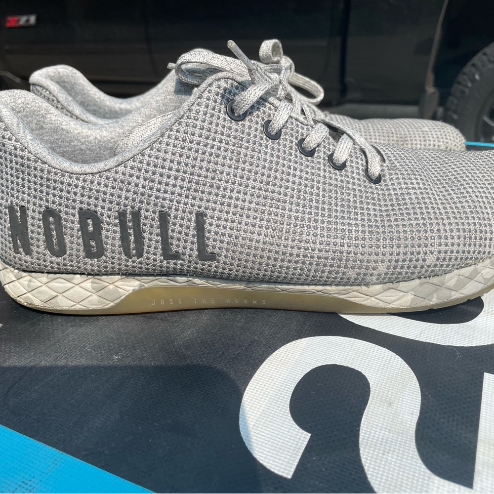 Gray NOBULL trainers.